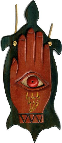 eye-in-hand wood carving by F. Yelliott 5-91 to Dr. Honerkamp